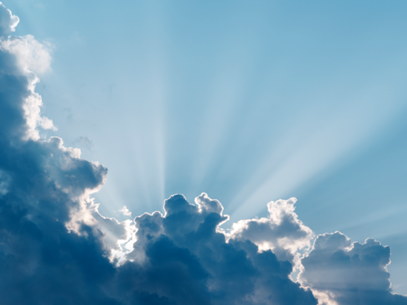 cloud with sun behind it